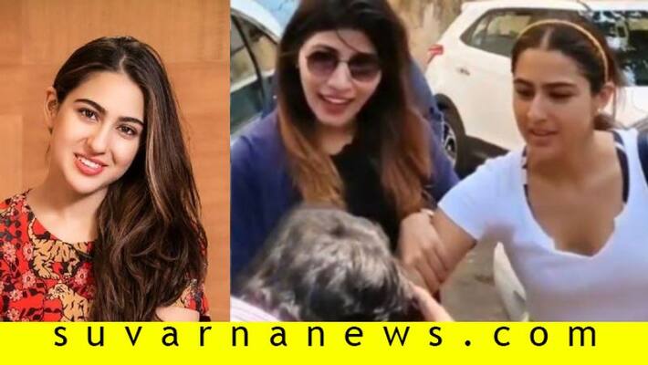 Bollywood Sara ali khan steps out of gym fans tries to kiss her hand Bollywood Sara ali khan steps out of gym fans tries to kiss her hand