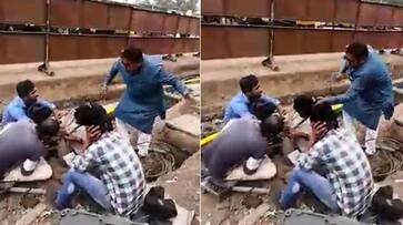 Neta or goon? Look how NCP corporator Kaptan Malik beats up helpless workers