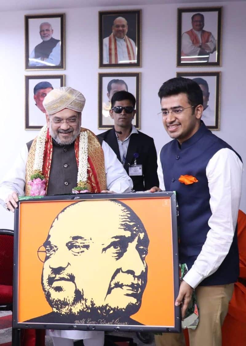 bjp mp tejasvi surya Gives Special Gift To Amit Shah after his Office inaugurate In Bengaluru