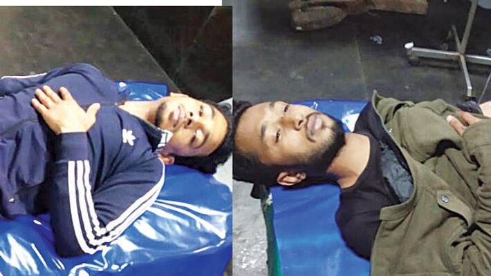 Police open fire on two murder suspects Police open fire on two murder suspects