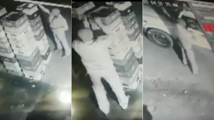 police man caught stealing packets of milk in noida police man caught stealing packets of milk in noida