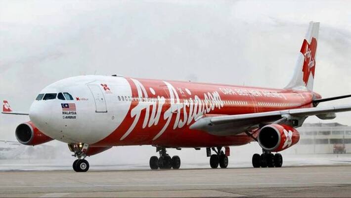 Suspected covid 19 passengers on board pilot exits from Airasia cockpit window Suspected covid 19 passengers on board pilot exits from Airasia cockpit window