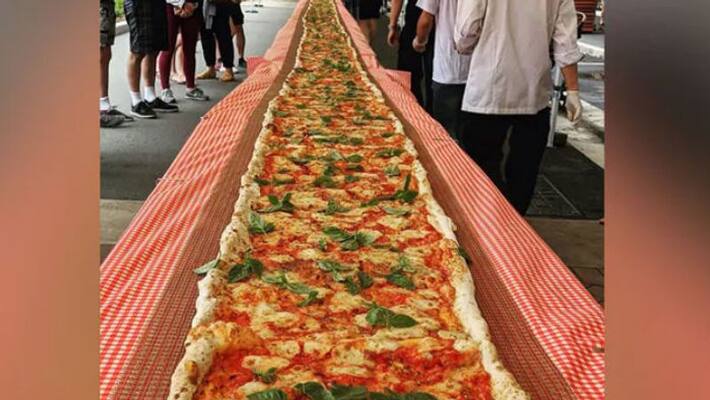 pizza shop owners prepared giant pizza to raise funds for australia firefighters pizza shop owners prepared giant pizza to raise funds for australia firefighters