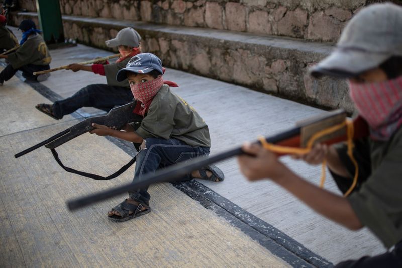 mexican children take guns for fight against drug gangs