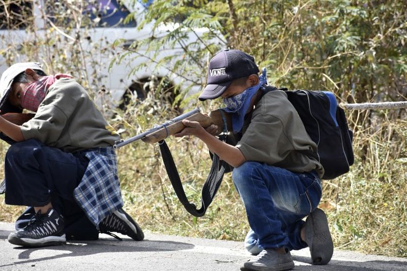 mexican children take guns for fight against drug gangs