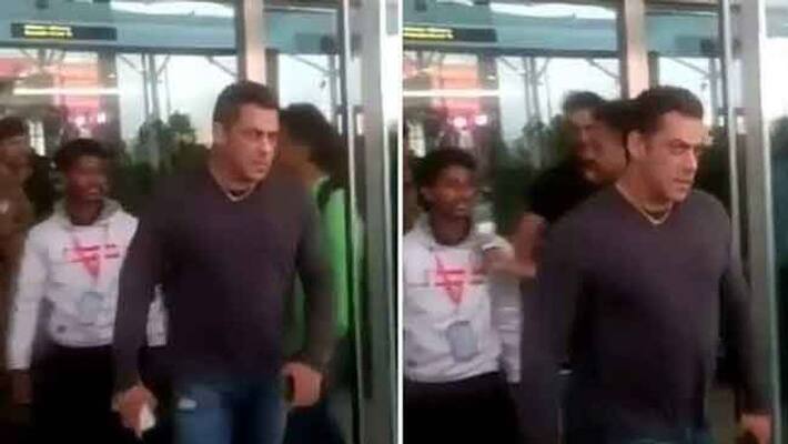 Salman Khan Snatches Phone From Fan Trying To Take Selfie In Airport Salman Khan Snatches Phone From Fan Trying To Take Selfie In Airport