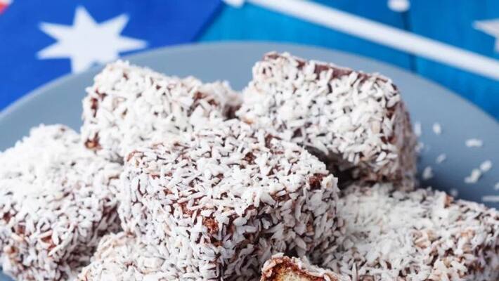 Woman dies in Australia Day lamington eating contest Woman dies in Australia Day lamington eating contest