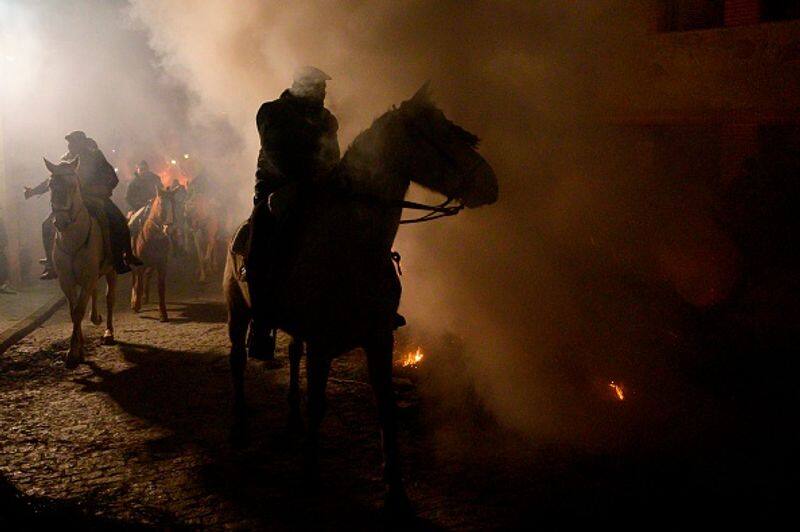 Horses leap through flames in Spain