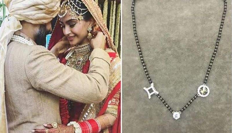 Sonam Kapoor's mangalsutra has the sun signs - Sonam's Gemini and Anand's Leo on each side of the big solitaire diamond that is clasped with it. Price – not disclosed.