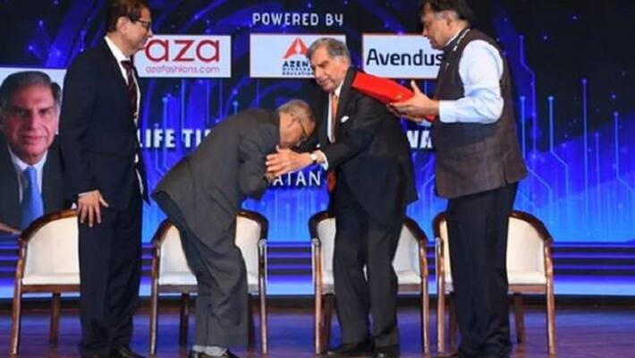infosys co-founder narayana murthy touches ratan tatas feet and presented award infosys co-founder narayana murthy touches ratan tatas feet and presented award