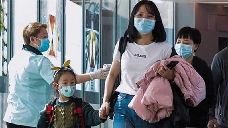people covering plastic cover whole body due to shortage of mask