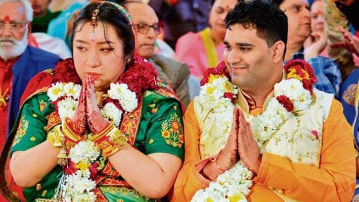 Indian Man and Chinese woman marry in Madhya Pradesh Indian Man and Chinese woman marry in Madhya Pradesh