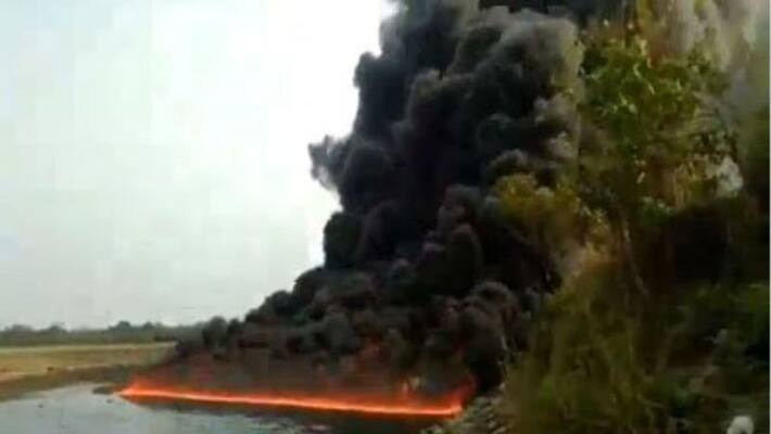 River water catches fire as crude oil leaks from a pipeline River water catches fire as crude oil leaks from a pipeline