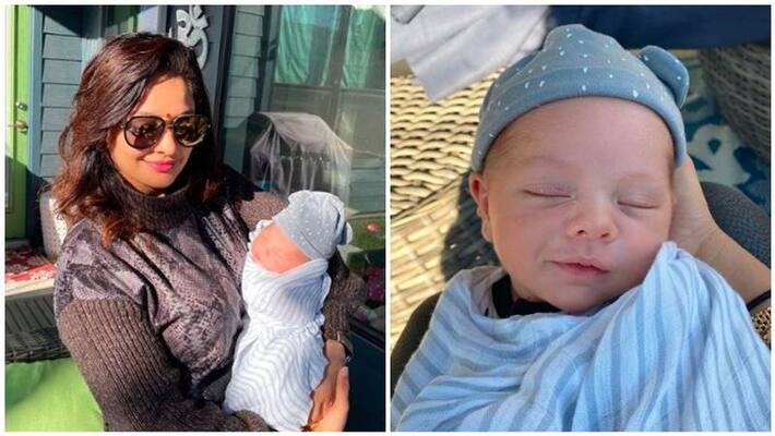 Pooja Kumar's photo with 14 days baby Pooja Kumar's photo with 14 days baby