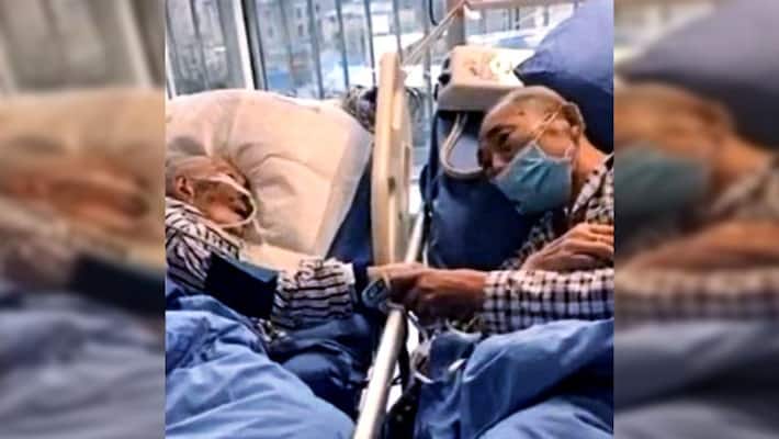 Elderly china couple with coronavirus says goodbye at hospital bed, Video goes viral Elderly china couple with coronavirus says goodbye at hospital bed, Video goes viral