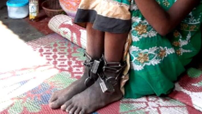 Family tied up girl with chain in burdwan Family tied up girl with chain in burdwan