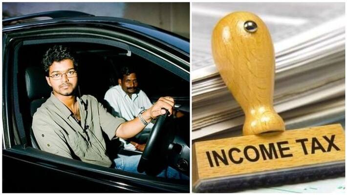 IT officials who took Vijay in his car IT officials who took Vijay in his car