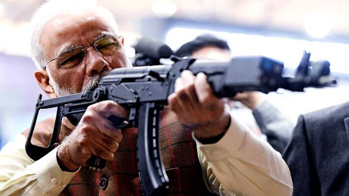 Prime Minister Narendra Modi shoot assault rifle at DefExpo 2020 Prime Minister Narendra Modi shoot assault rifle at DefExpo 2020