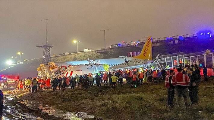 Plane breaks apart after skidding off runway in Turkey Plane breaks apart after skidding off runway in Turkey