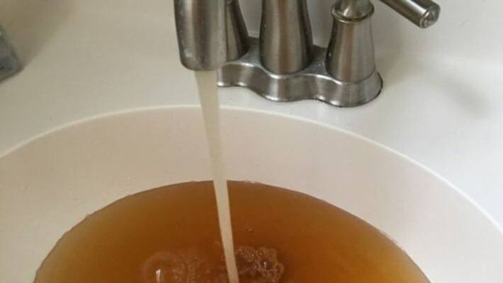 Kerala families stunned to find alcohol flowing from water taps Kerala families stunned to find alcohol flowing from water taps