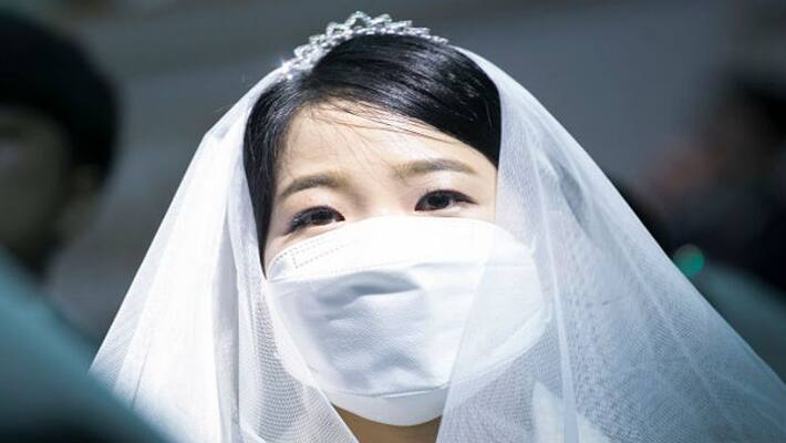 Couple attend wedding reception through video conferencing due to coronavirus fears Couple attend wedding reception through video conferencing due to coronavirus fears