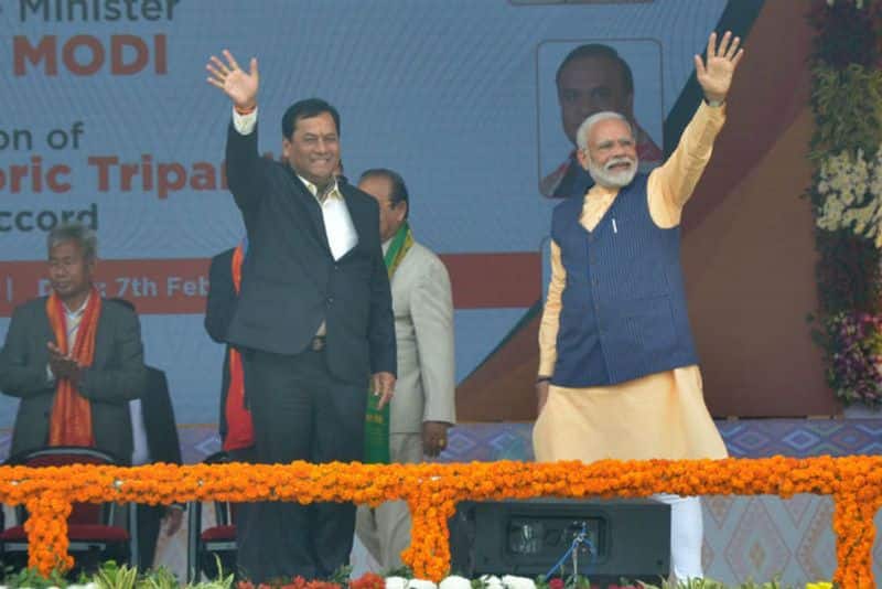 Prime Minister Narendra Modi alongwith Assam Chief Minister Sarbananda Sonowal and others at a public rally to celebrate the signing of the Bodo agreement, in Kokrajhar, Assam.