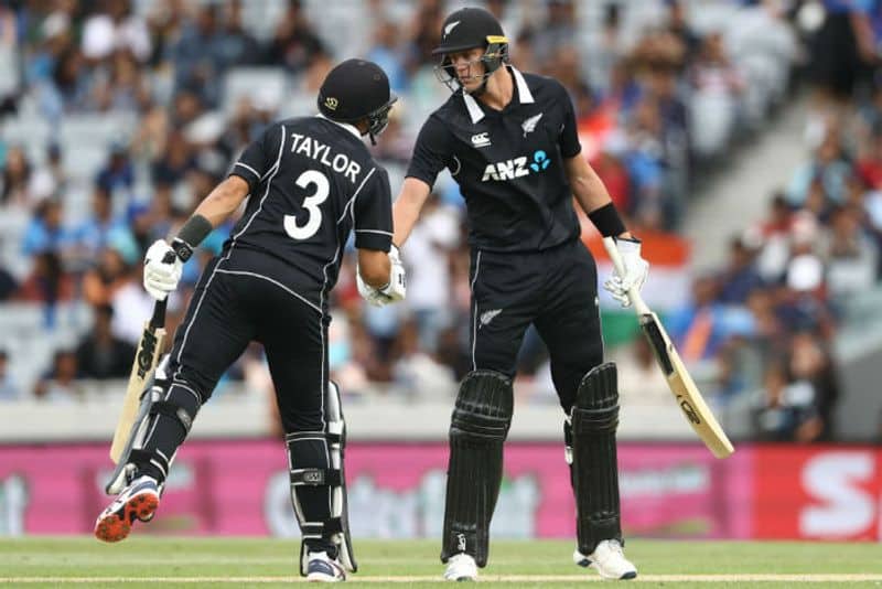 Kyle Jamieson and Ross Taylor of the Black Caps shake hands during game two of the One Day International Series between New Zealand and India at at Eden Park on February 08, 2020 in Auckland, New Zealand.