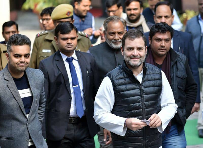 Congress leader Rahul Gandhi leaves after casting his vote during the Delhi Assembly election, at NP Senior Secondary School in New Delhi on Saturday.