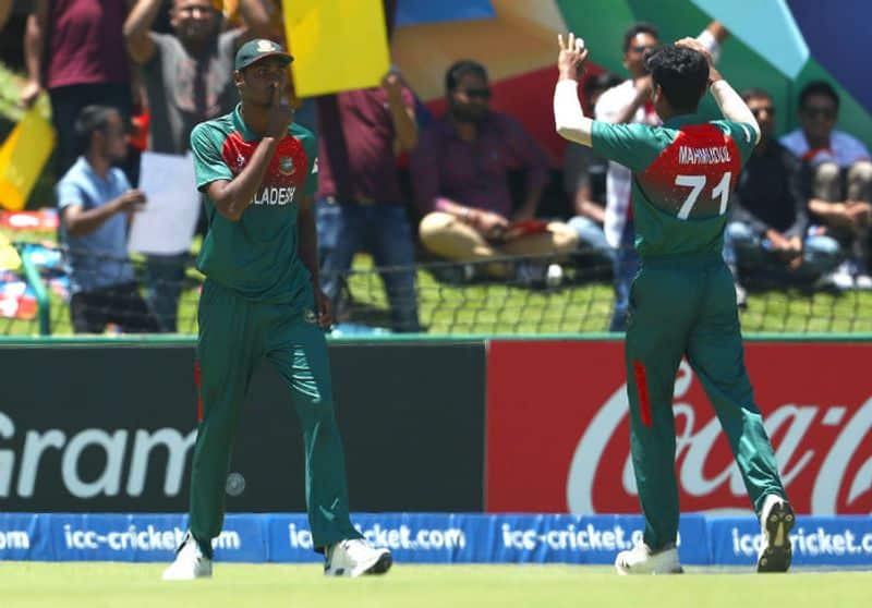 Mohammad Shoriful Islam of Bangladesh celebrates catching Tilak Varma of India during the ICC U19 Cricket World Cup Super League Final match between India and Bangladesh at JB Marks Oval on February 09, 2020 in Potchefstroom, South Africa. (Photo by Matthew Lewis-ICCICC via Getty Images)