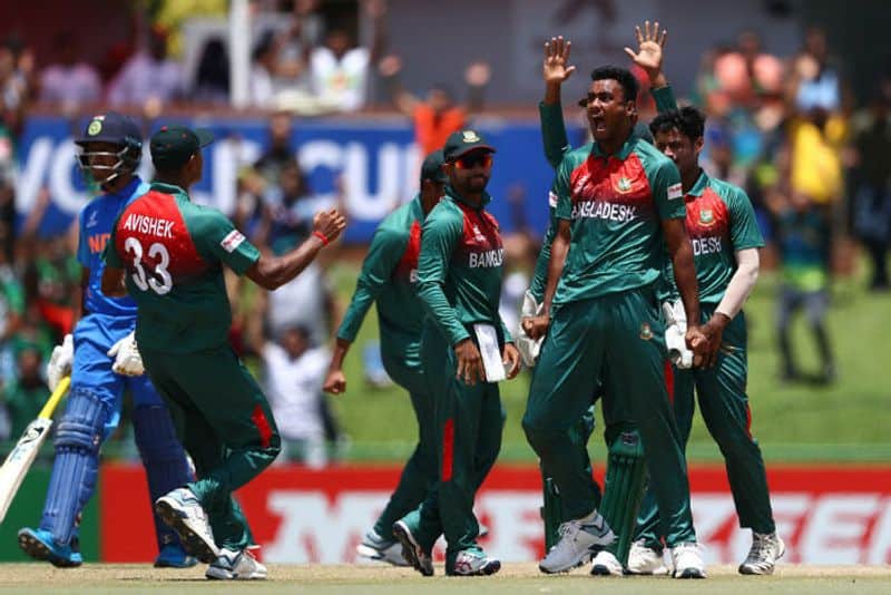 Mohammad Shoriful Islam of Bangladesh celebrates the wicket of Siddhesh Veer of India, after he was bowled LBW during the ICC U19 Cricket World Cup Super League Final match between India and Bangladesh at JB Marks Oval on February 09, 2020 in Potchefstroom, South Africa. (Photo by Matthew Lewis-ICCICC via Getty Images)