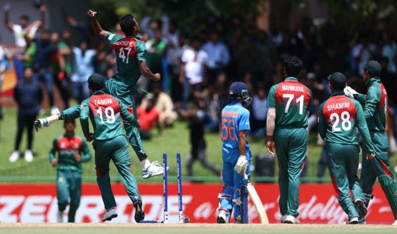 Mohammad Shoriful Islam of Bangladesh celebrates running out Ravi Bishnoi of India during the ICC U19 Cricket World Cup Super League Final match between India and Bangladesh at JB Marks Oval on February 09, 2020 in Potchefstroom, South Africa. (Photo by Matthew Lewis-ICCICC via Getty Images)