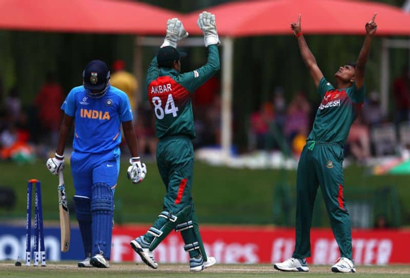 Avishek Das of Bangladesh celebrates bowling Atharva Ankolekar of India during the ICC U19 Cricket World Cup Super League Final match between India and Bangladesh at JB Marks Oval on February 09, 2020 in Potchefstroom, South Africa. (Photo by Matthew Lewis-ICCICC via Getty Images)