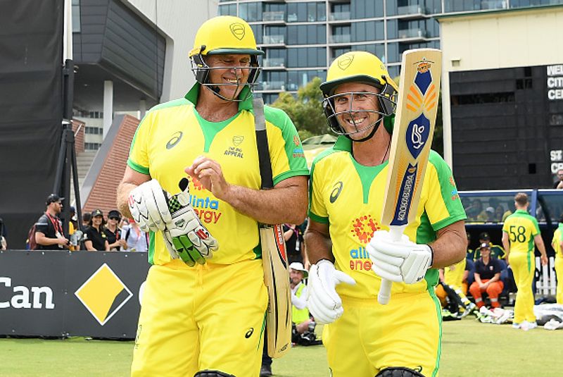 Matthew Hayden and Justin Langer head out for another onslaught