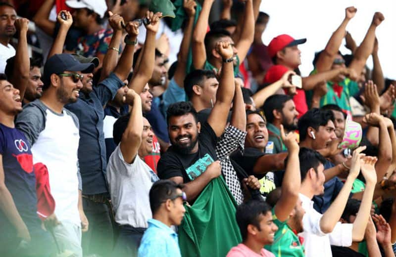 Bangladesh fans celebrate a wicket during the ICC U19 Cricket World Cup Super League Final match between India and Bangladesh at JB Marks Oval on February 09, 2020 in Potchefstroom, South Africa. (Photo by Jan Kruger-ICCICC via Getty Images)