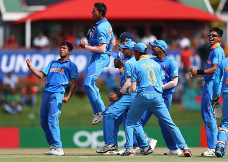 India players celebrate the wicket of Shahadat Hossain of Bangladesh during the ICC U19 Cricket World Cup Super League Final match between India and Bangladesh at JB Marks Oval on February 09, 2020 in Potchefstroom, South Africa. (Photo by Matthew Lewis-ICCICC via Getty Images)