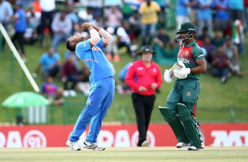 Sushant Mishra of India celebrates taking a wicket during the ICC U19 Cricket World Cup Super League Final match between India and Bangladesh at JB Marks Oval on February 09, 2020 in Potchefstroom, South Africa. (Photo by Jan Kruger-ICCICC via Getty Images)