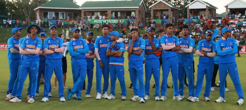 The India team look on, after losing to Bangladesh during the ICC U19 Cricket World Cup Super League Final match between India and Bangladesh at JB Marks Oval on February 09, 2020 in Potchefstroom, South Africa. (Photo by Matthew Lewis-ICCICC via Getty Images)