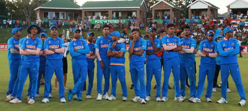 The India team look on, after losing to Bangladesh during the ICC U19 Cricket World Cup Super League Final match between India and Bangladesh at JB Marks Oval on February 09, 2020 in Potchefstroom, South Africa. (Photo by Matthew Lewis-ICCICC via Getty Images)