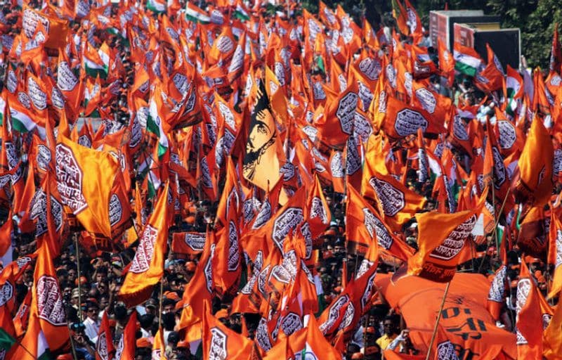 Maharashtra Navnirman Sena (MNS) workers participate in a march from Marine Drive to Azad Maidan, demanding eviction of illegal immigrants from Pakistan and Bangladesh staying in India, in Mumbai on Sunday. (ANI Photo)