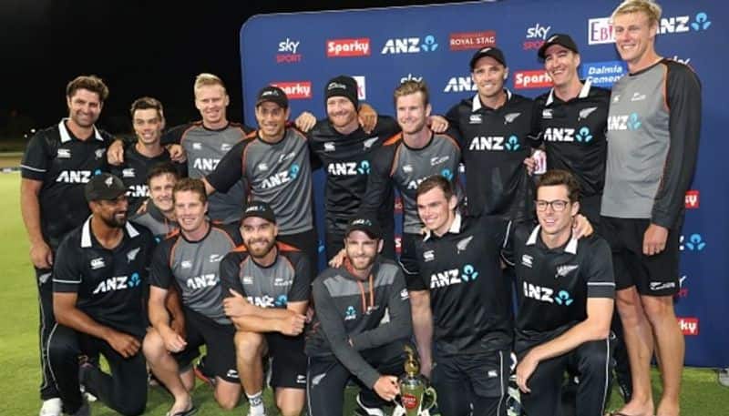 New Zealand players pose for pictures after winning the series 3-0