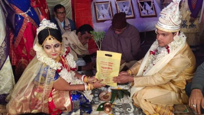 Bride gives plant to start marriage rituals in Burdwan Bride gives plant to start marriage rituals in Burdwan