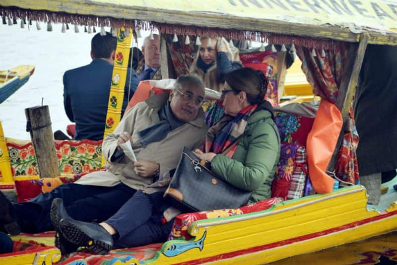The 25 foreign envoys of the second batch take a Shikara ride during their visit, at Dal Lake in Srinagar on Wednesday. (ANI Photo)