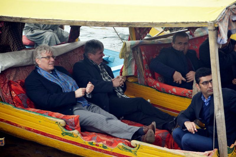 The 25 foreign envoys of the second batch take a Shikara ride during their visit, at Dal Lake in Srinagar on Wednesday. (ANI Photo)