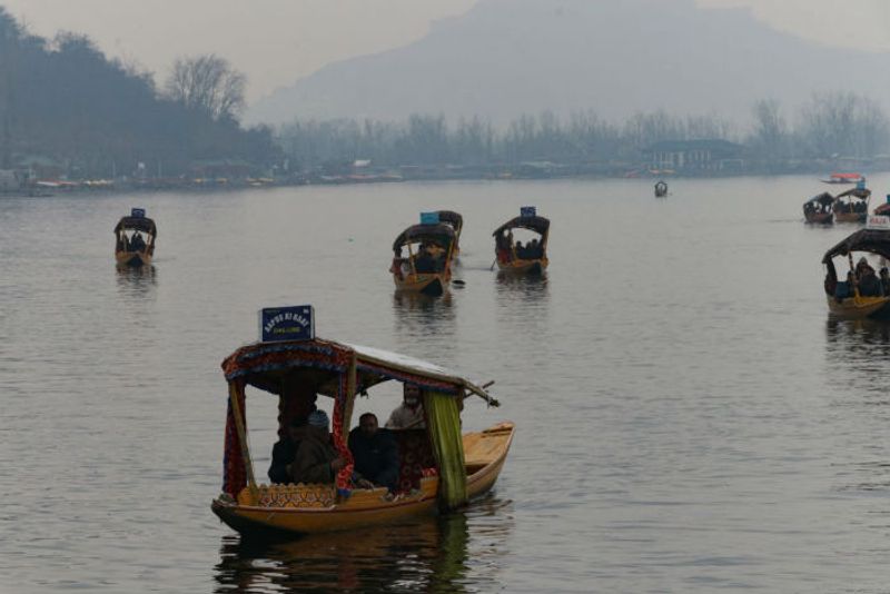 EU convoy enjoys shikara ride in the waters of Dal Lake. (Photograph: Adil AbassBarcroft Media via Getty Images)