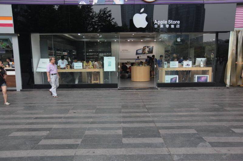 apple company to reopen some stores in beijing today company official site says