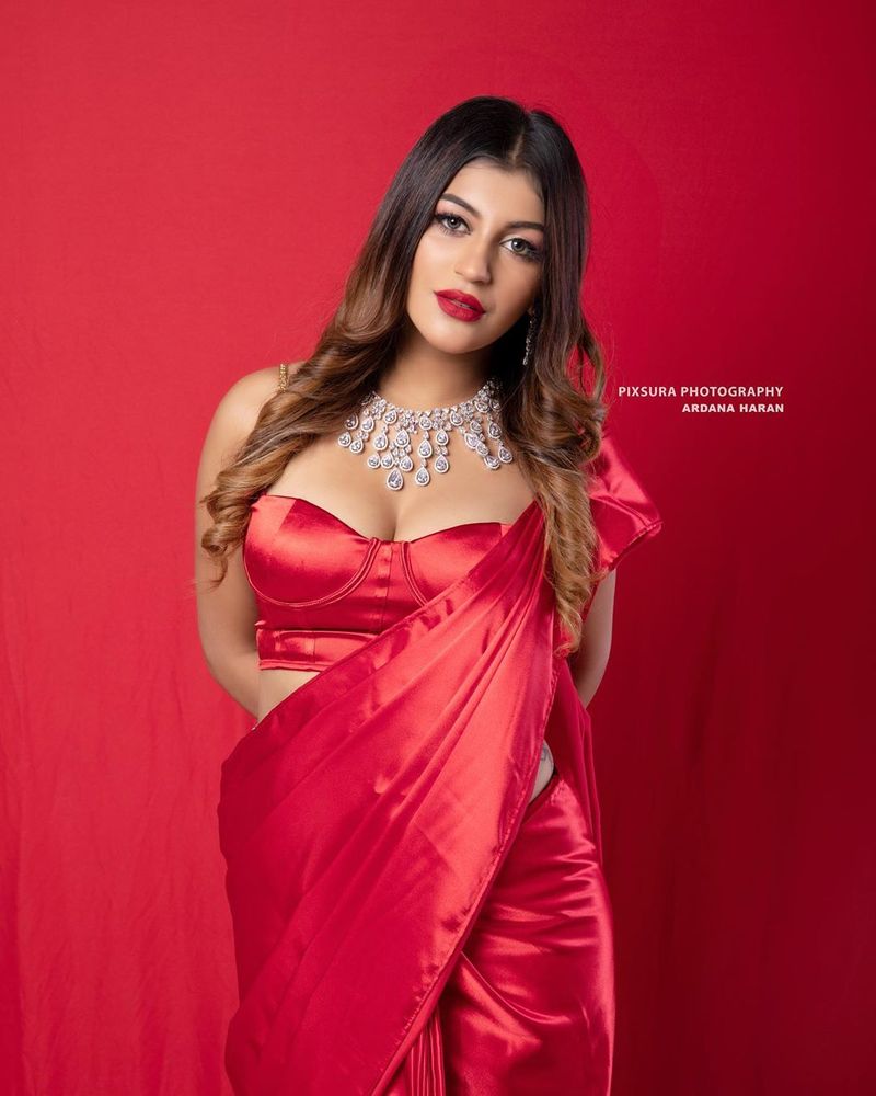 Big Boss Fame Yashika Anand Secret Tattoo Show in Hot Red Saree Photo Shoot