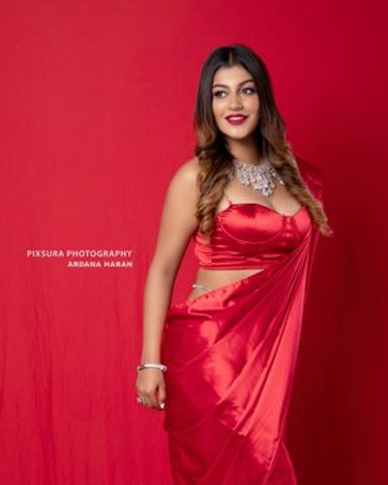 Big Boss Fame Yashika Anand Secret Tattoo Show in Hot Red Saree Photo Shoot