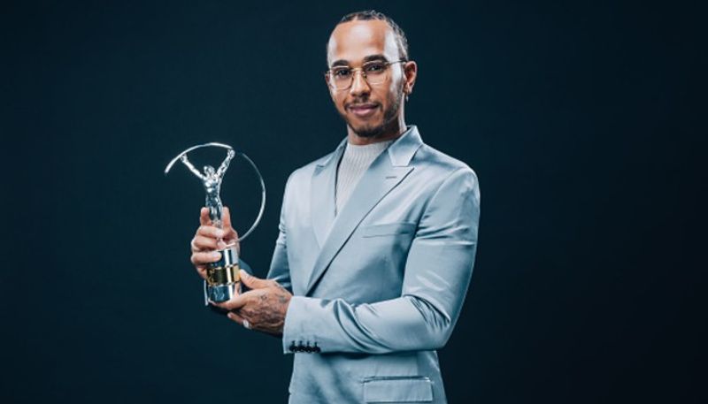 Lewis Hamilton poses with his trophy. He won the Best Sportsman of the year honour with Lionel Messi. Messi was not present at the awards ceremony