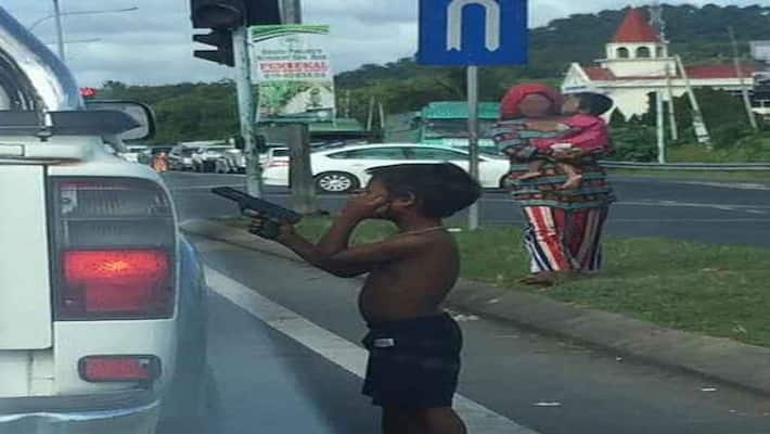 7 year old caught scaring people with gun at traffic signal asking money kph 7 year old caught scaring people with gun at traffic signal asking money kph