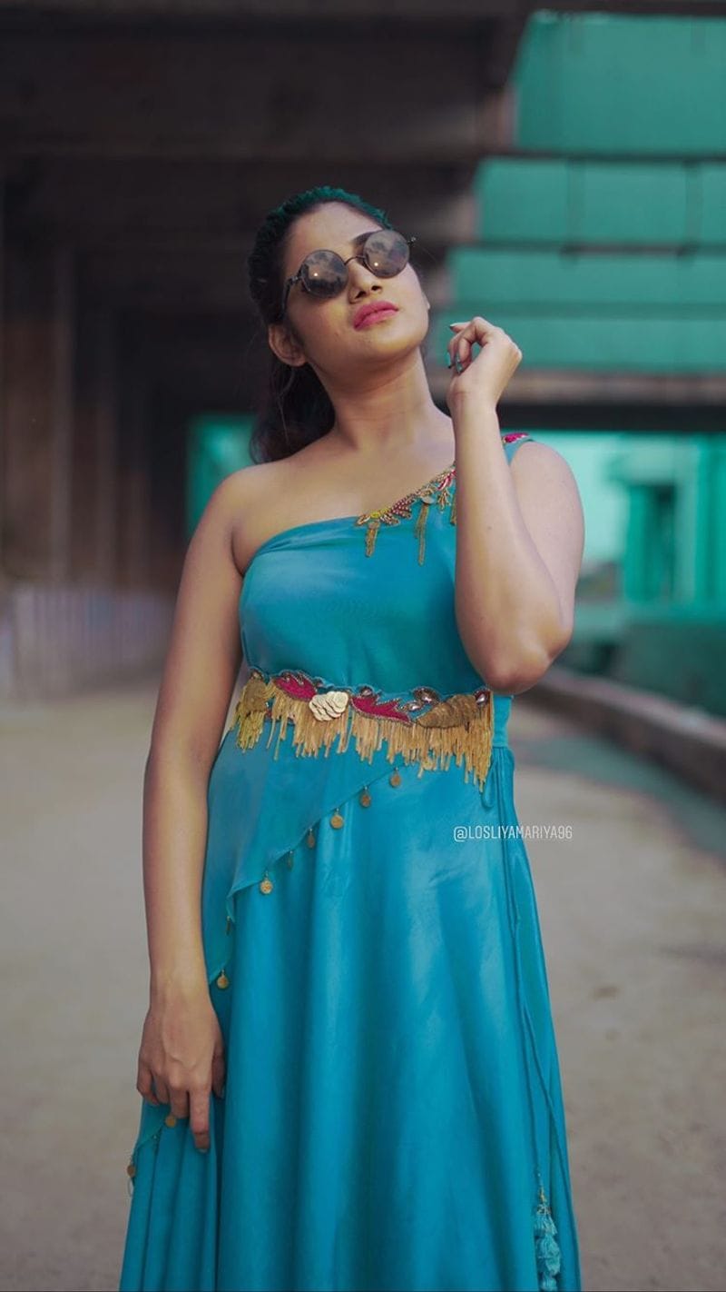 biggboss losliya recent sharing green color dress photo gallery